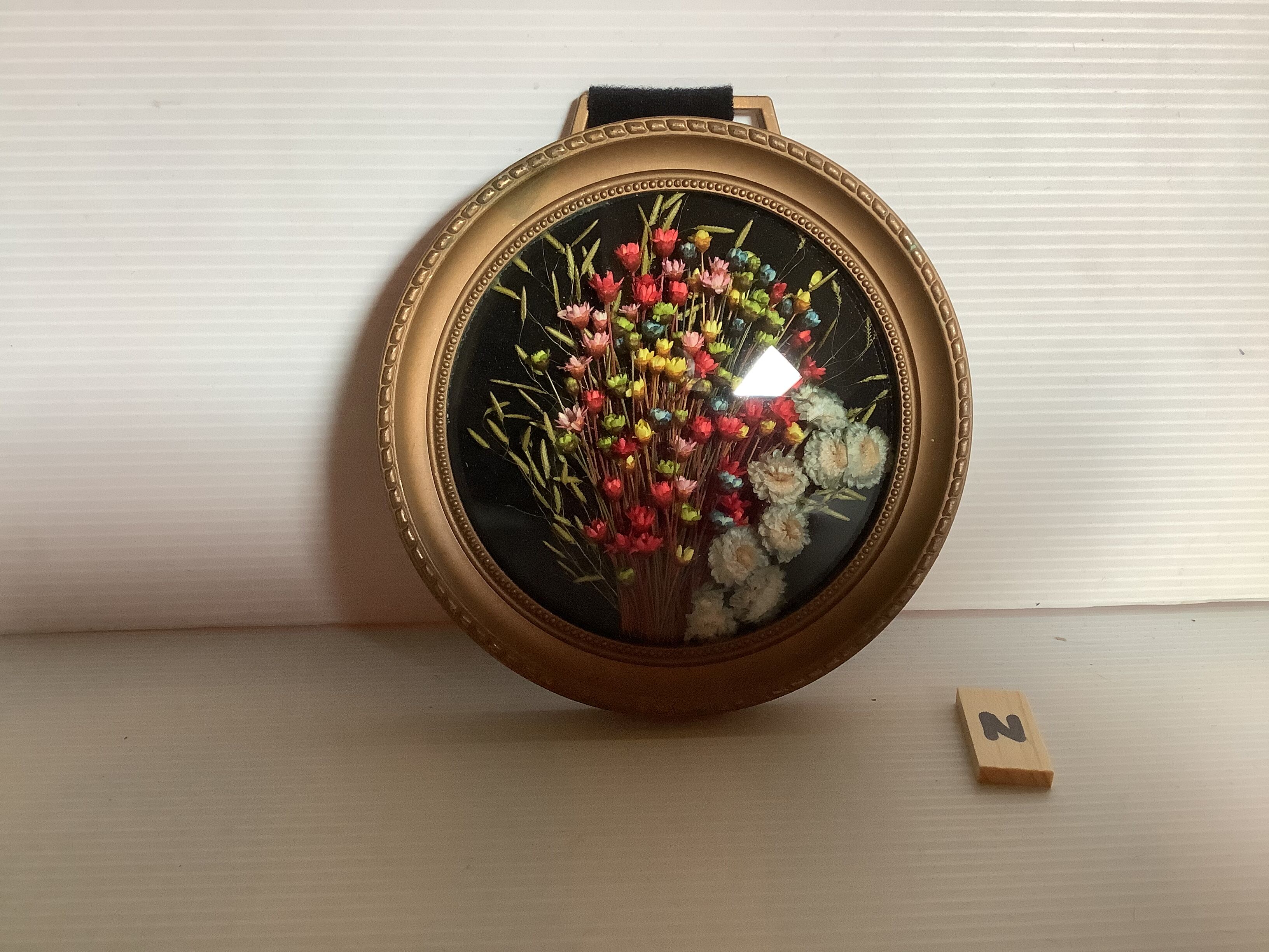 Old small round frame curved glass natural dried flowers