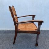 Vintage armchair in straw and brutalist wood