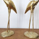 Couple large herons in polished golden brass