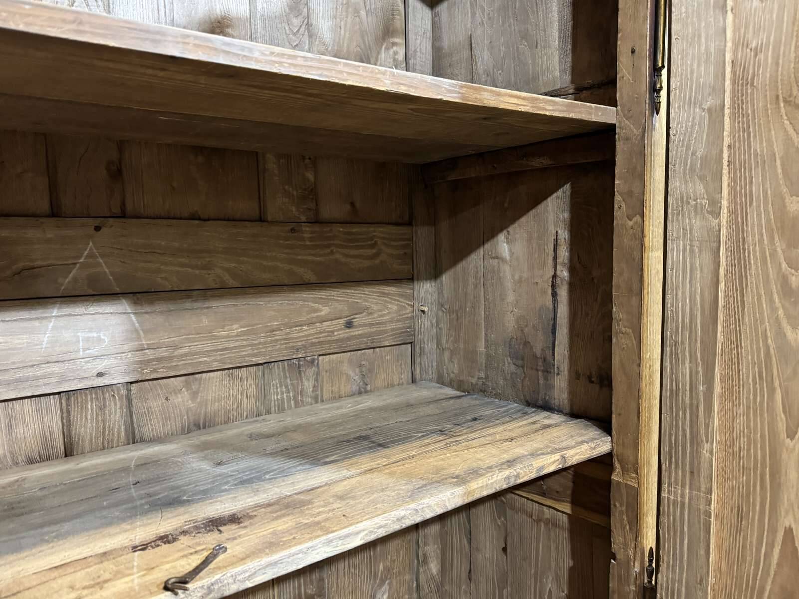 19th-century country wardrobe in blonde chestnut.