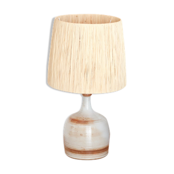 Marais stoneware lamp with raffia shade from the 1960s.