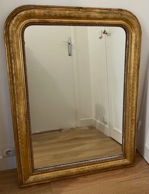 Old mirror Louis-Philippe in gilded wood