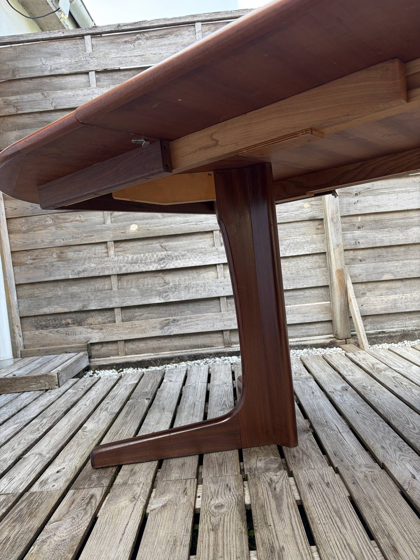 Oval teak table extendable with two leaves, Baumann style.