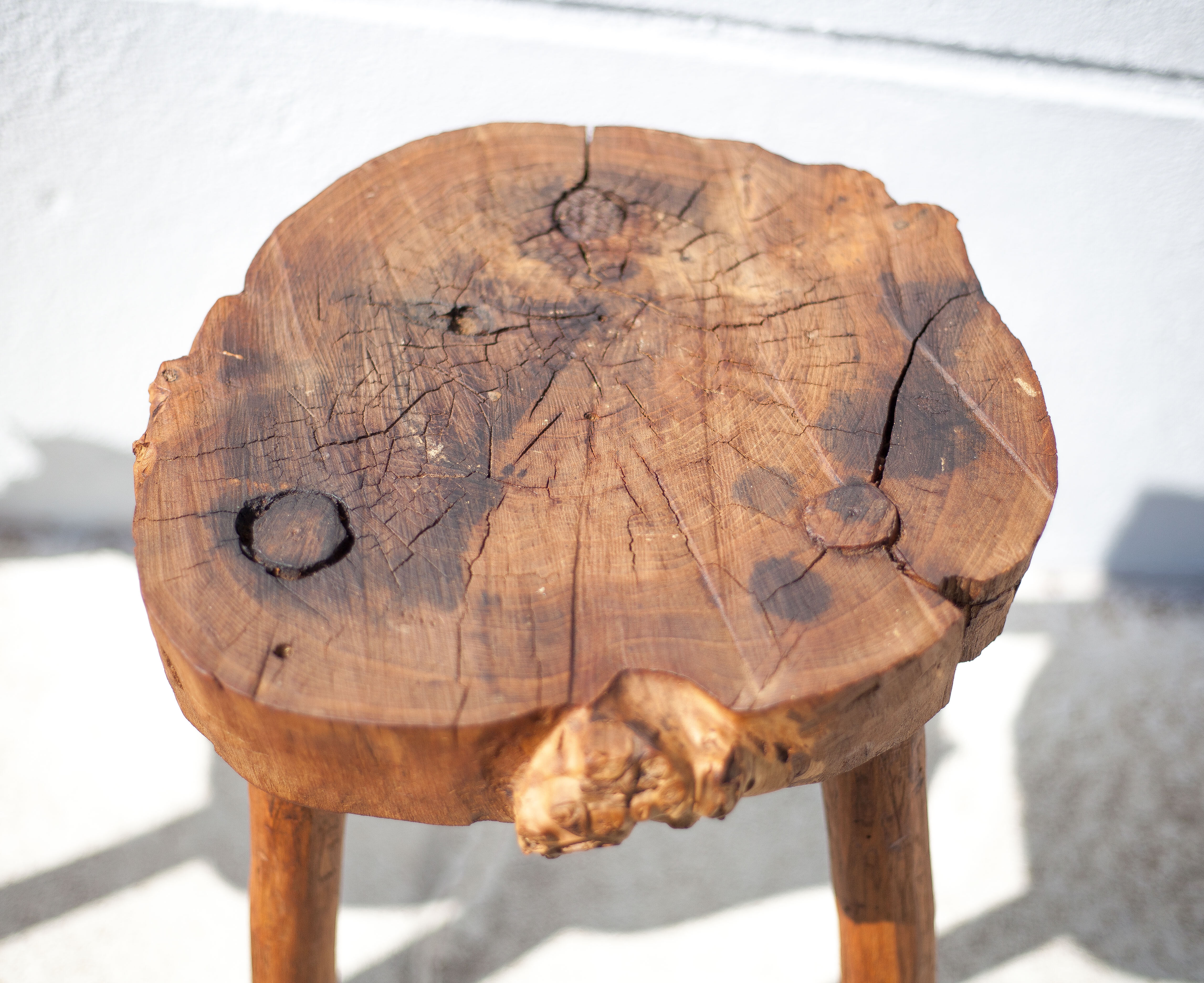 Pair of brutalist tripod wood stools