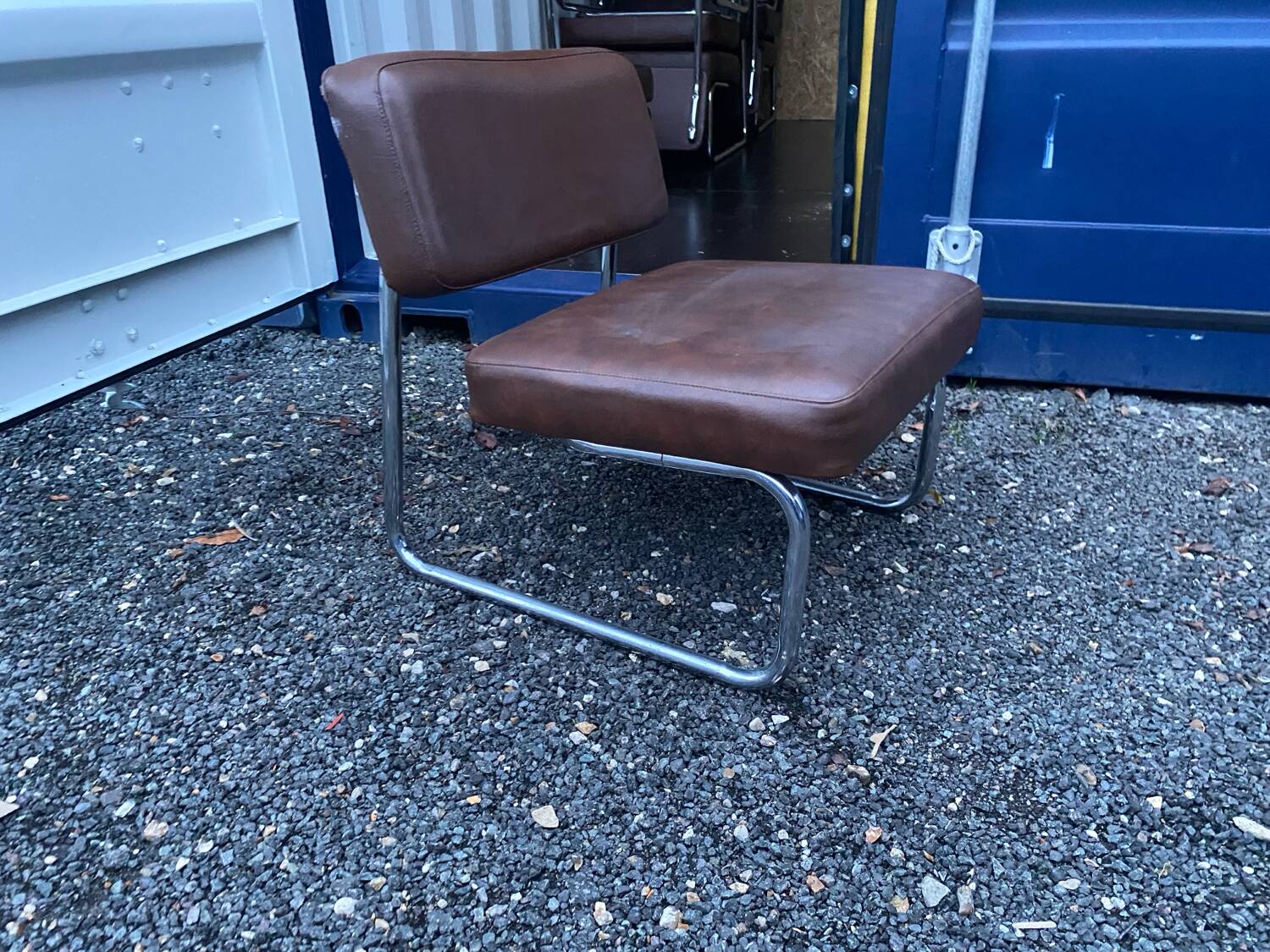 Vintage low cantilever armchair – Brown faux leather & tubular frame