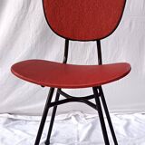 sixties chair with steel tube legs and a skaï seat