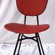 sixties chair with steel tube legs and a skaï seat