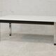 Coffee table chrome steel base, white melaminate top. France, circa 1970.