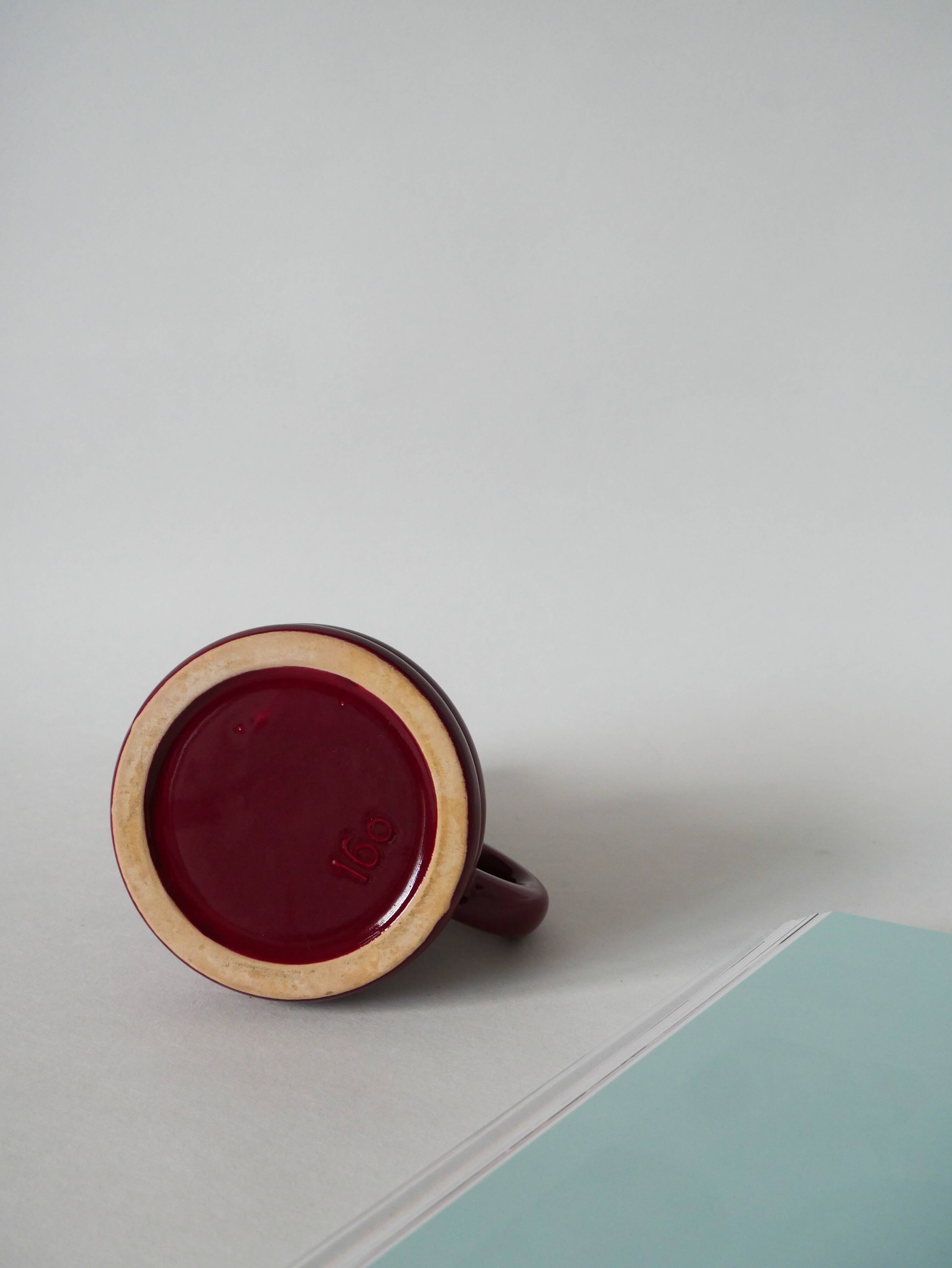 large burgundy ceramic candle holder numbered 1970