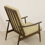 Scandinavian armchair 1960 curved armrests.