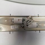 Wall lamp from Paulmann with white opal glass shade.