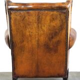 Irresistible old sheep leather wingback armchair with the most beautiful colors