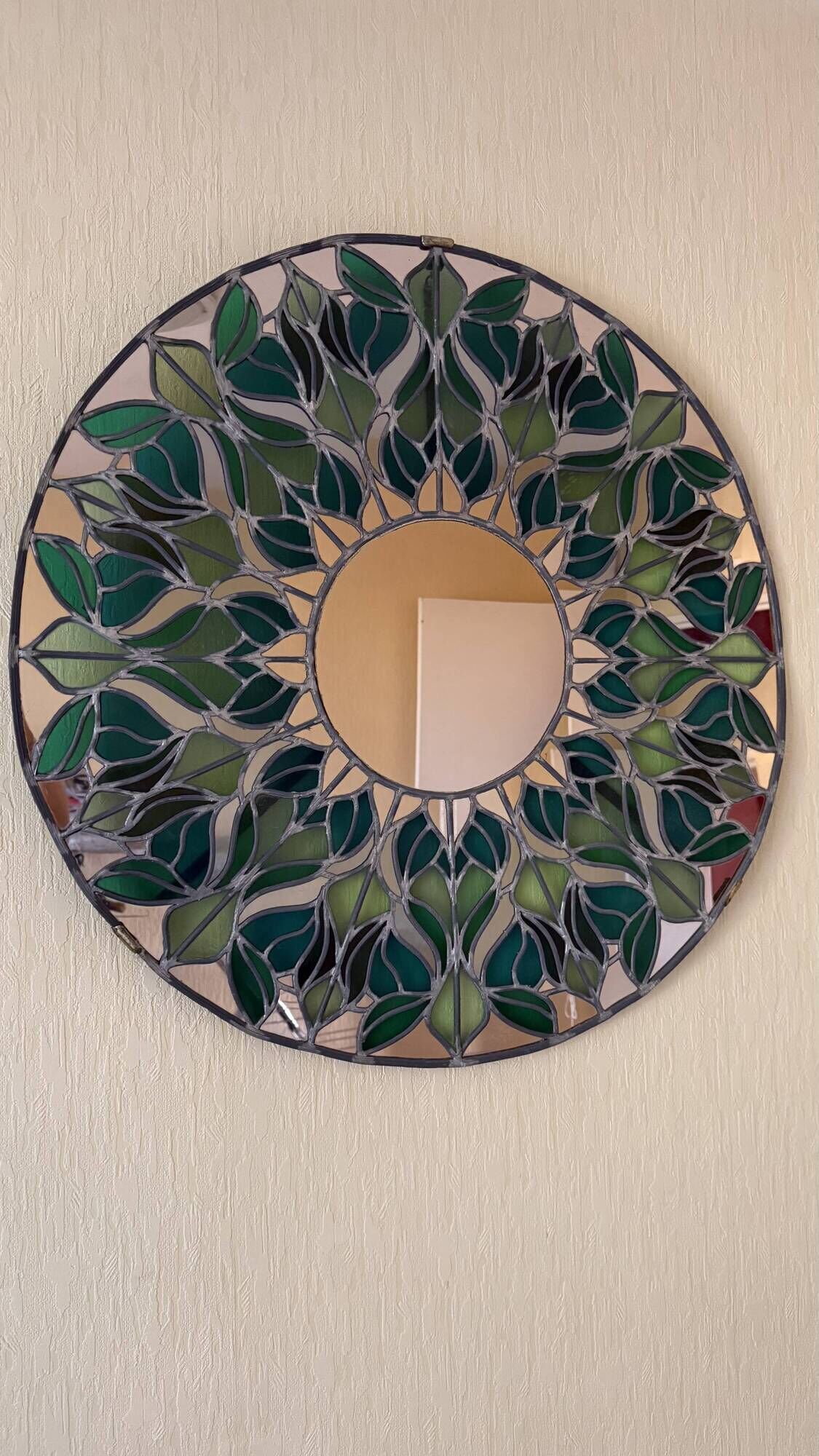 Tiffany stained glass mirror with plant decoration signed B. Nogaro