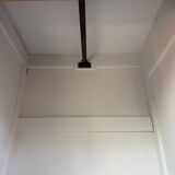 Display cabinet with hanging space