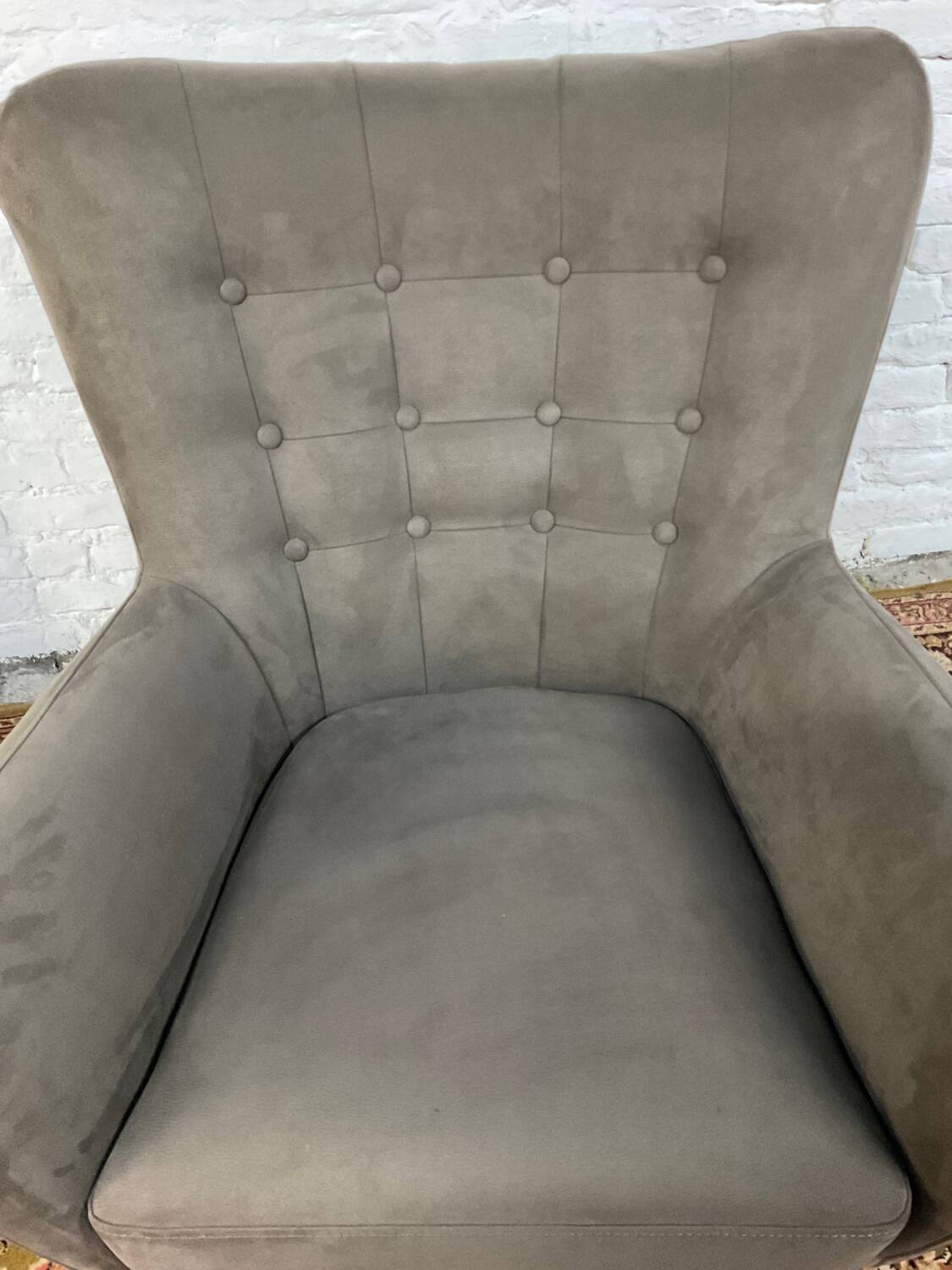 Swivel armchair in velvet fabric and metal