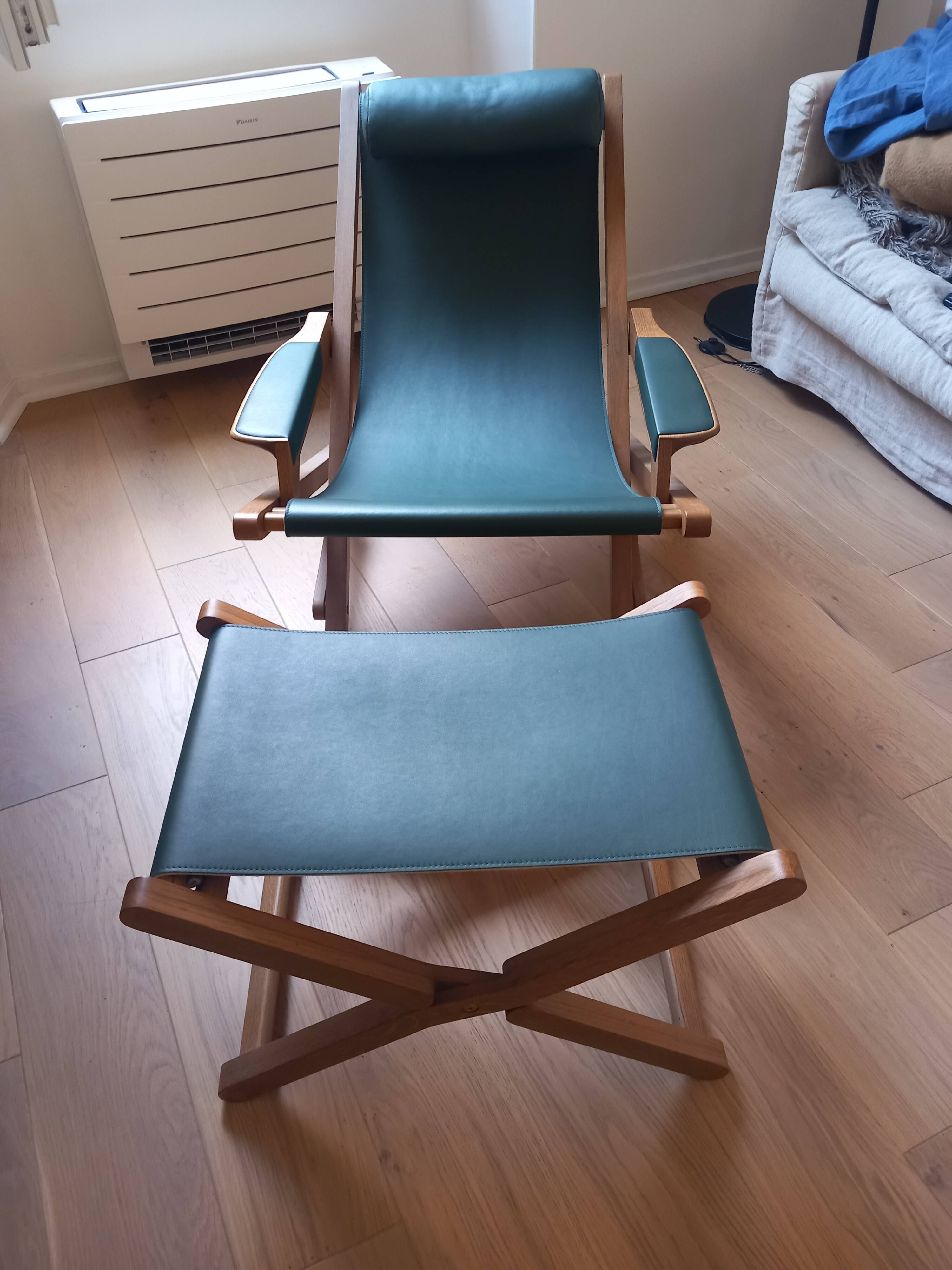 Oak and leather lounge chair designed by Emile DUVIVIER