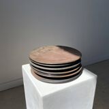 Series of 7 brown ceramic plates