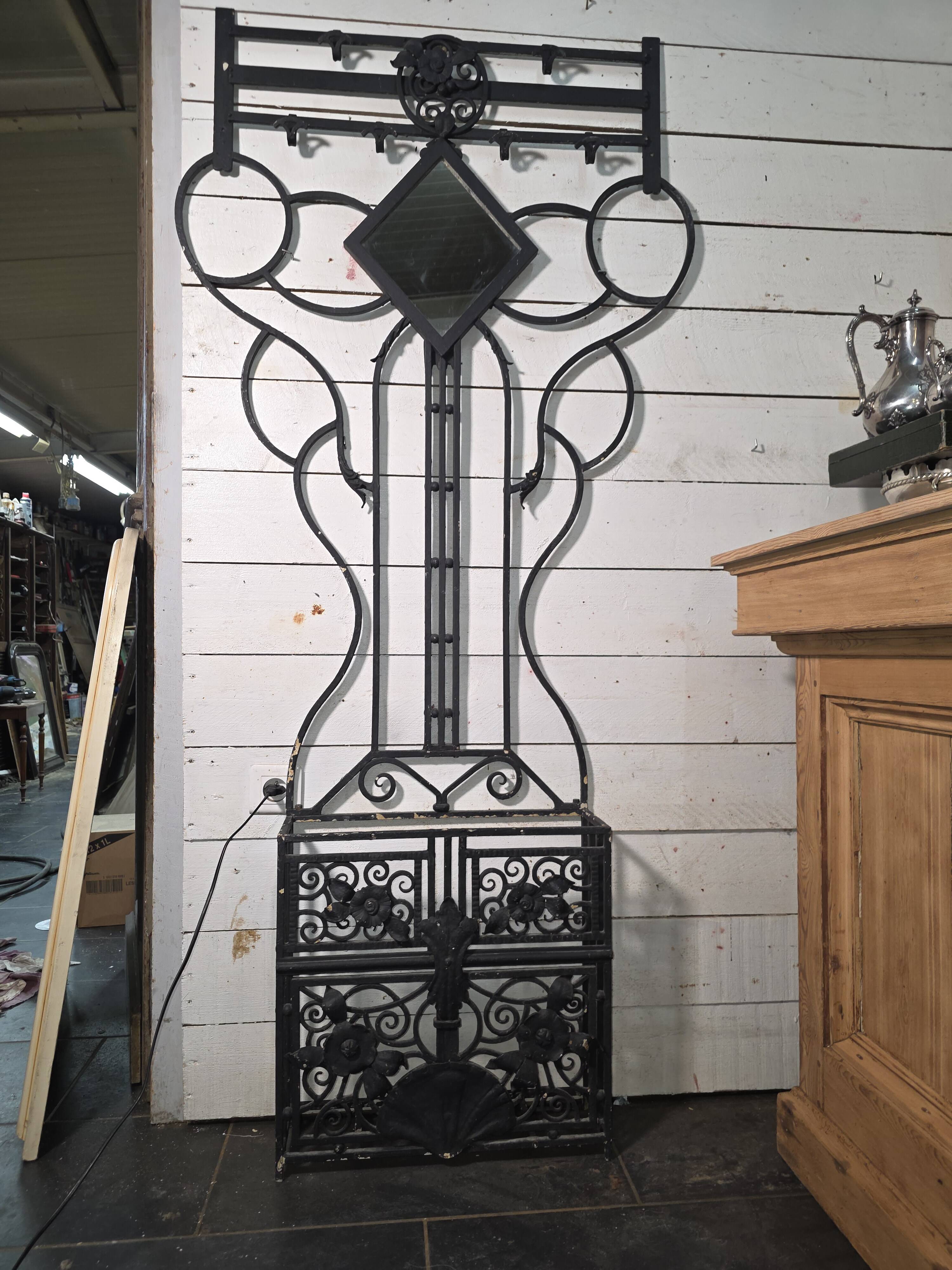 Art Deco coat rack wardrobe in wrought iron from the 1930s.
