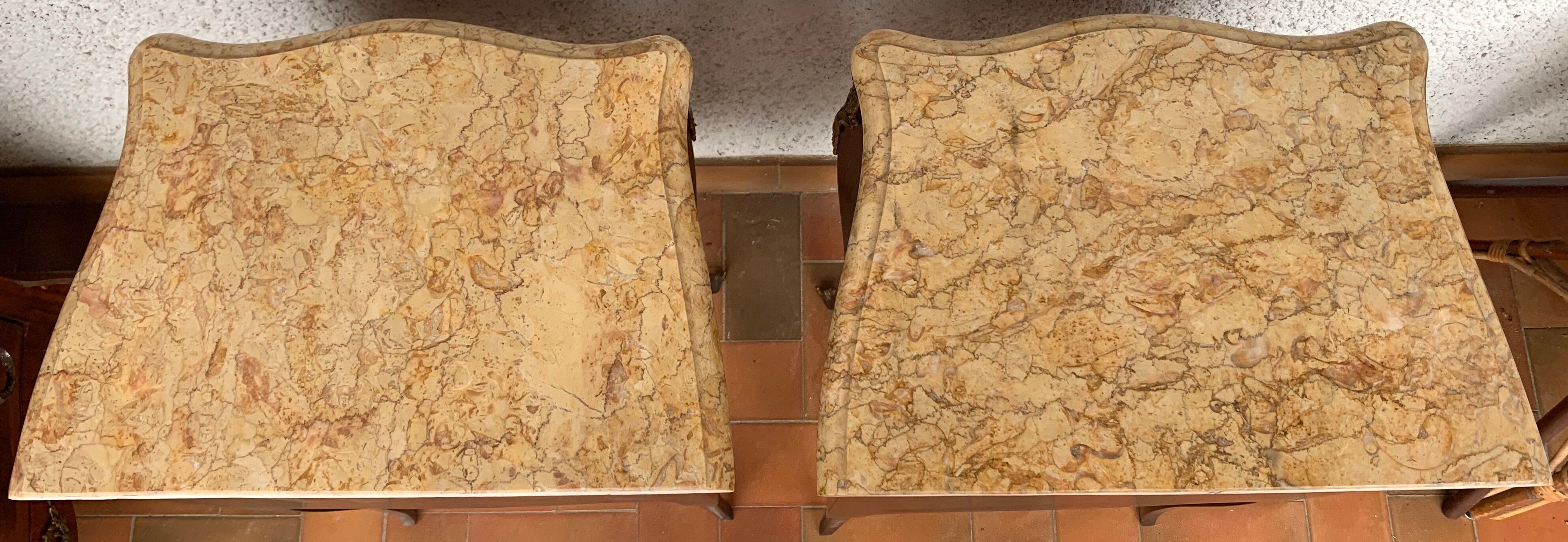 Pair of rosewood and marble bedsides