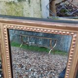 Miroir ancien en bois doré style louis xvi