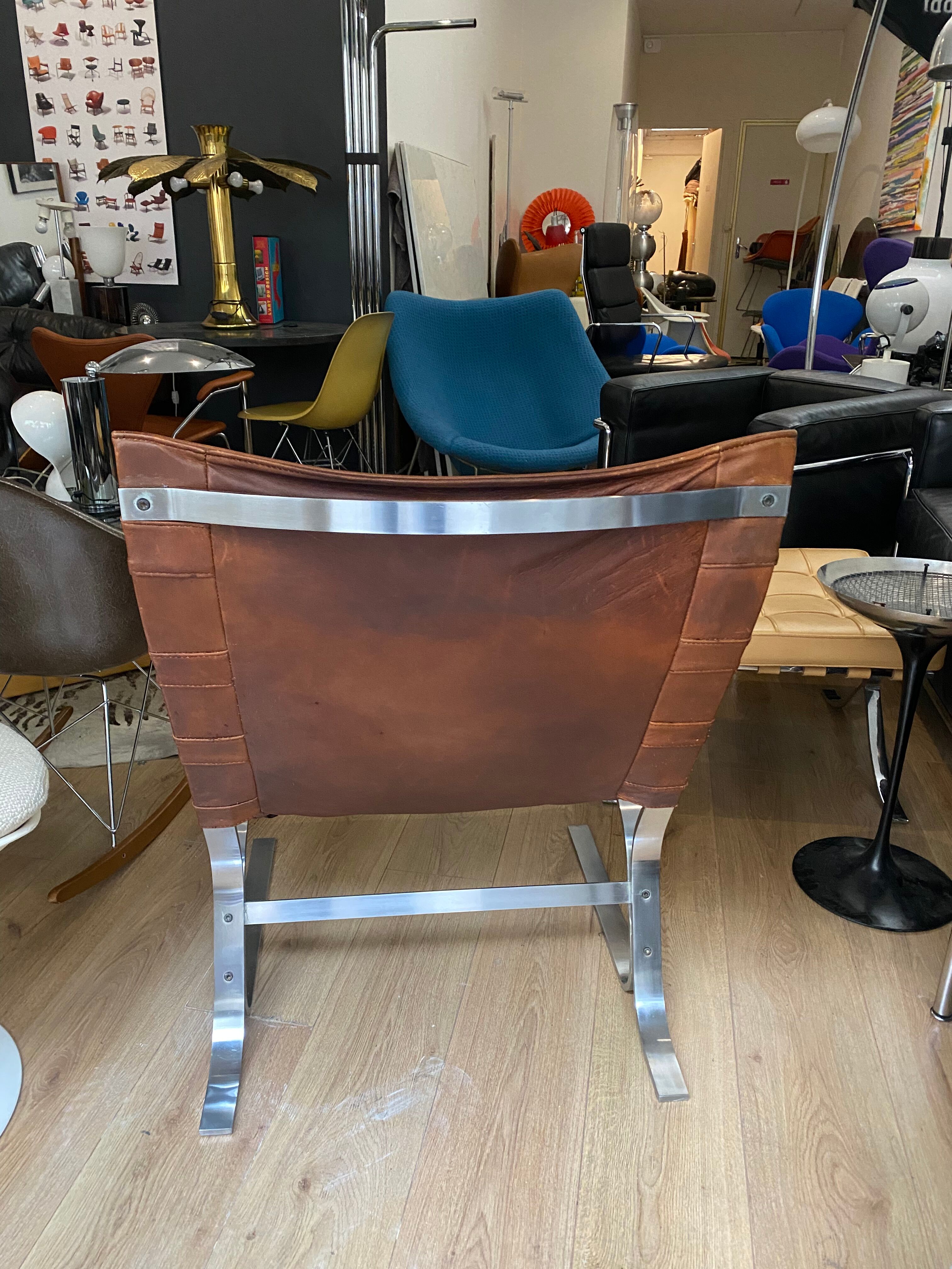 Vintage armchair design steel and leathers stretched 70s