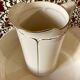 Washbasin and toilet jug in Sarreguemines earthenware.