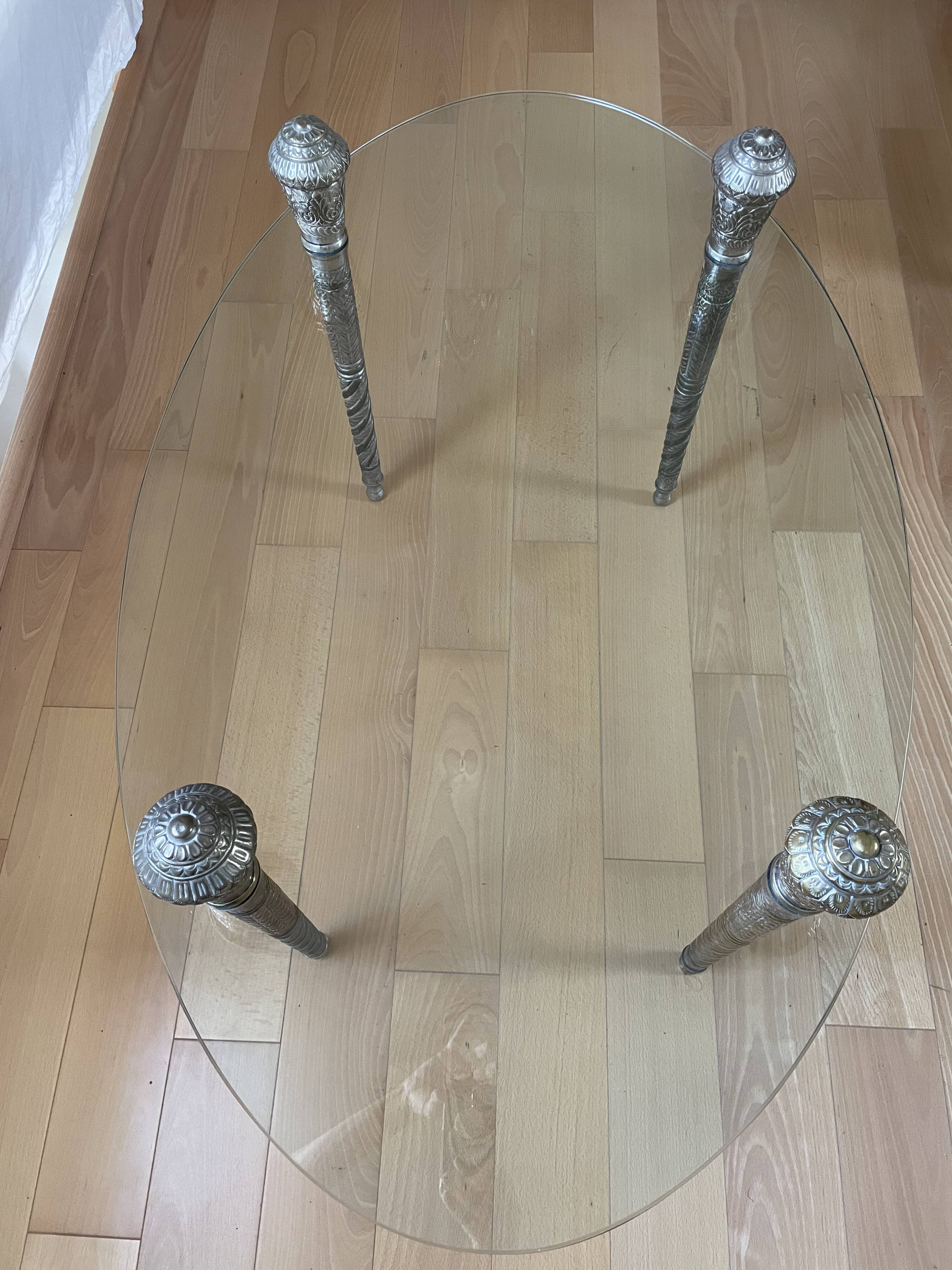 Glass coffee table with metal legs