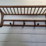 Curved wooden coat rack