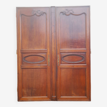 Pair of carved oak cabinet doors