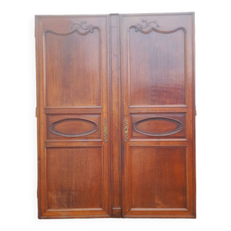 Paire de portes d'armoires chêne sculptées