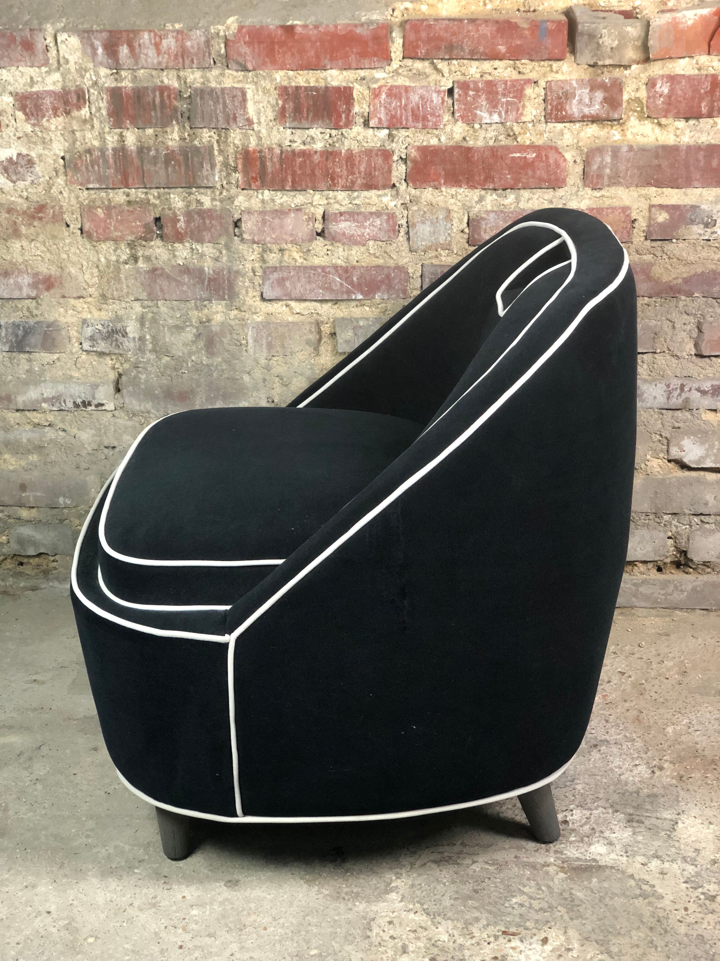Retro vintage 80's armchair in black velvet with white trim