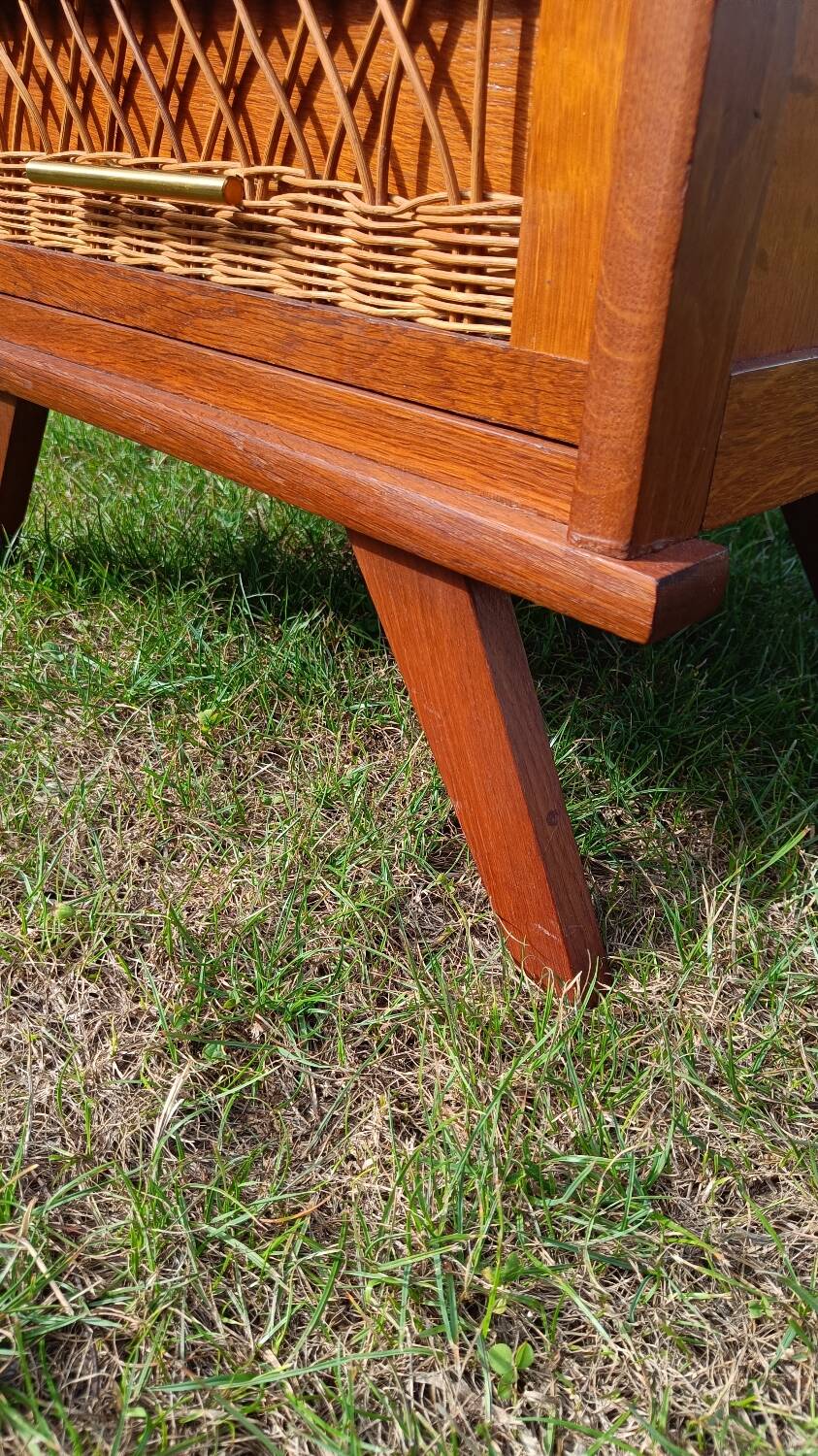 Tall chest of drawers in wood and rattan with splayed legs
