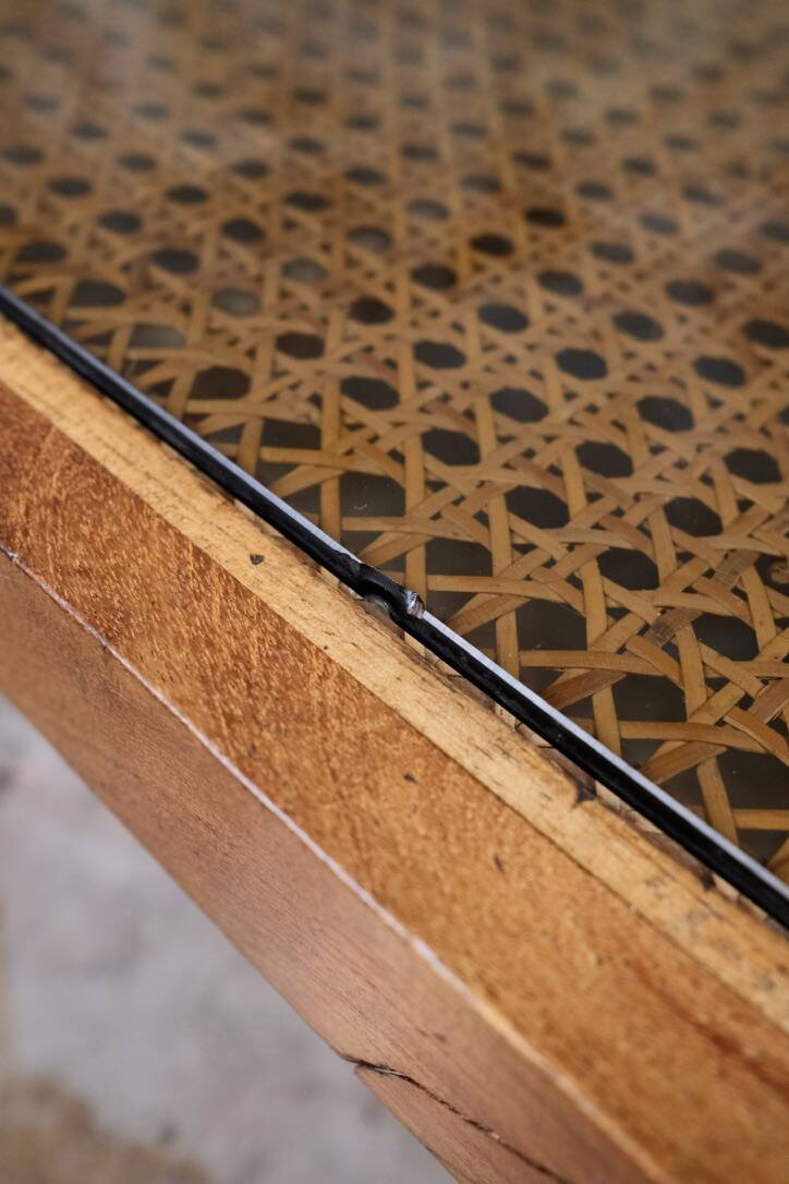 Cane and smoked glass coffee table, France, 1980.