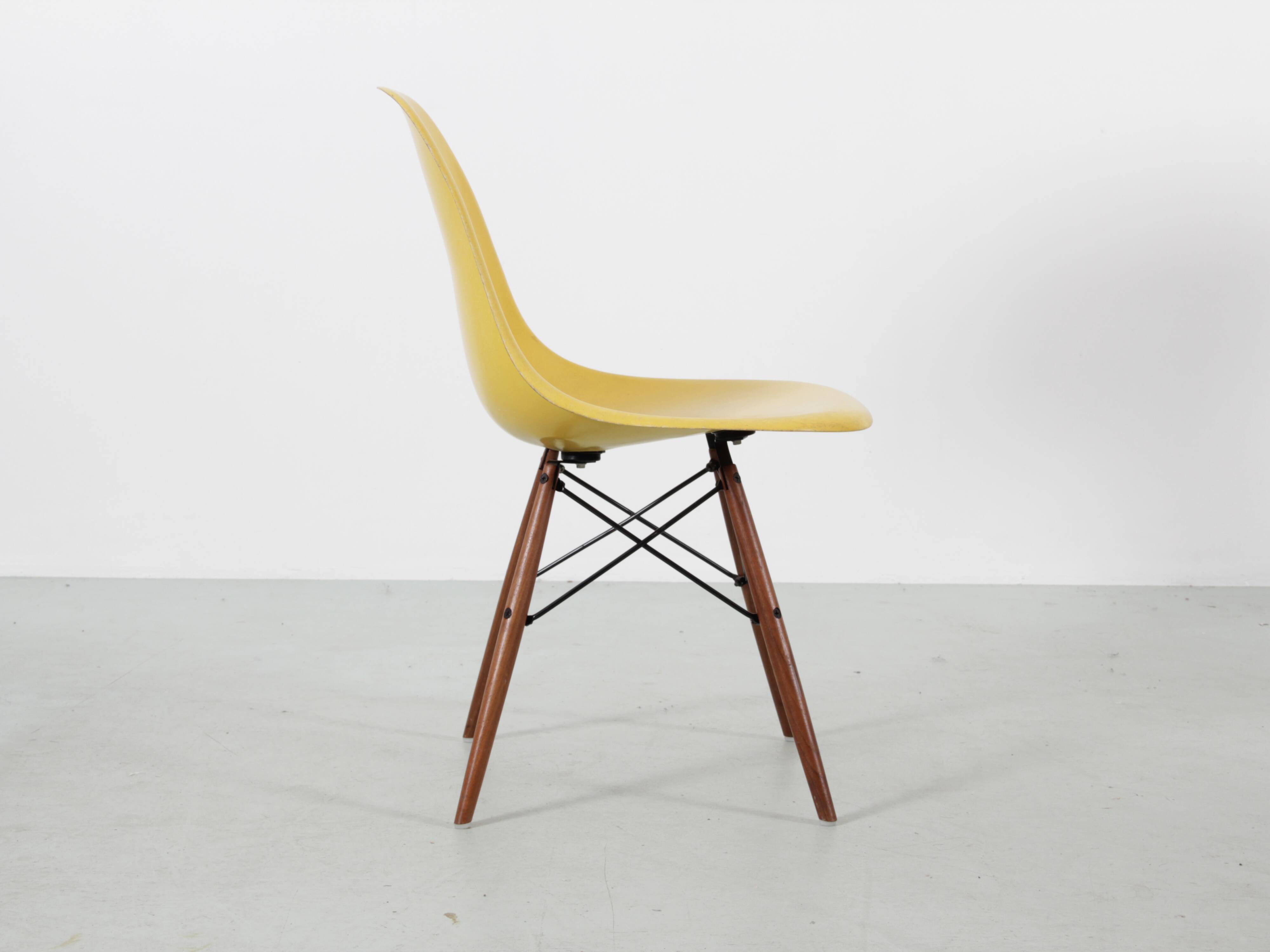 Set of 4 DSW chairs by Charles Eames - yellow fibreglass edition by Herman.
