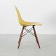 Set of 4 DSW chairs by Charles Eames - yellow fibreglass edition by Herman.