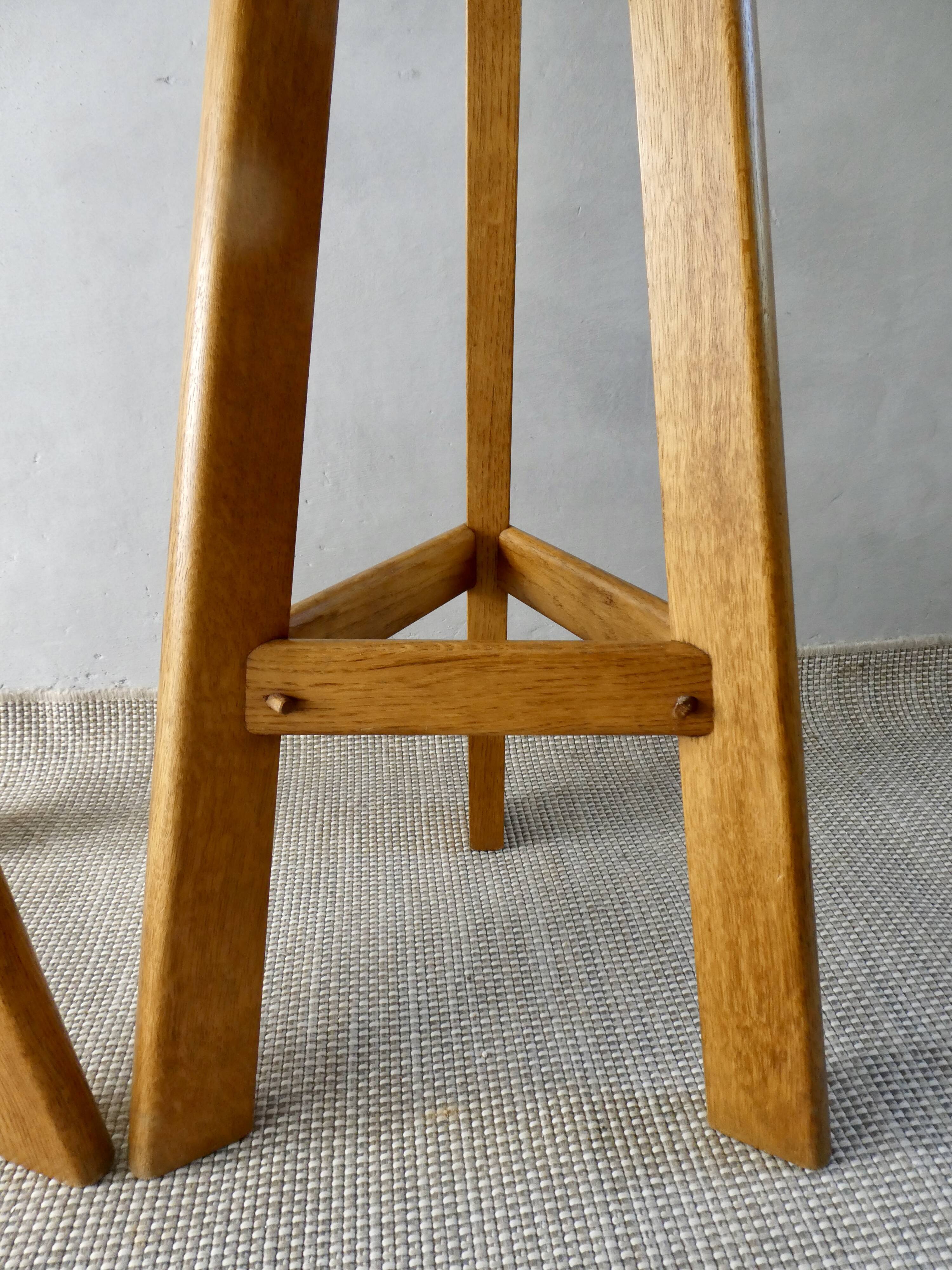 Pair of high bar stools, tripods, in solid wood