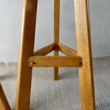 Pair of high bar stools, tripods, in solid wood