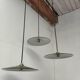 Suspensions in enamelled sheets