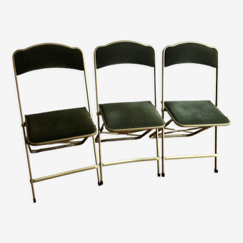 Set of three vintage green folding chairs