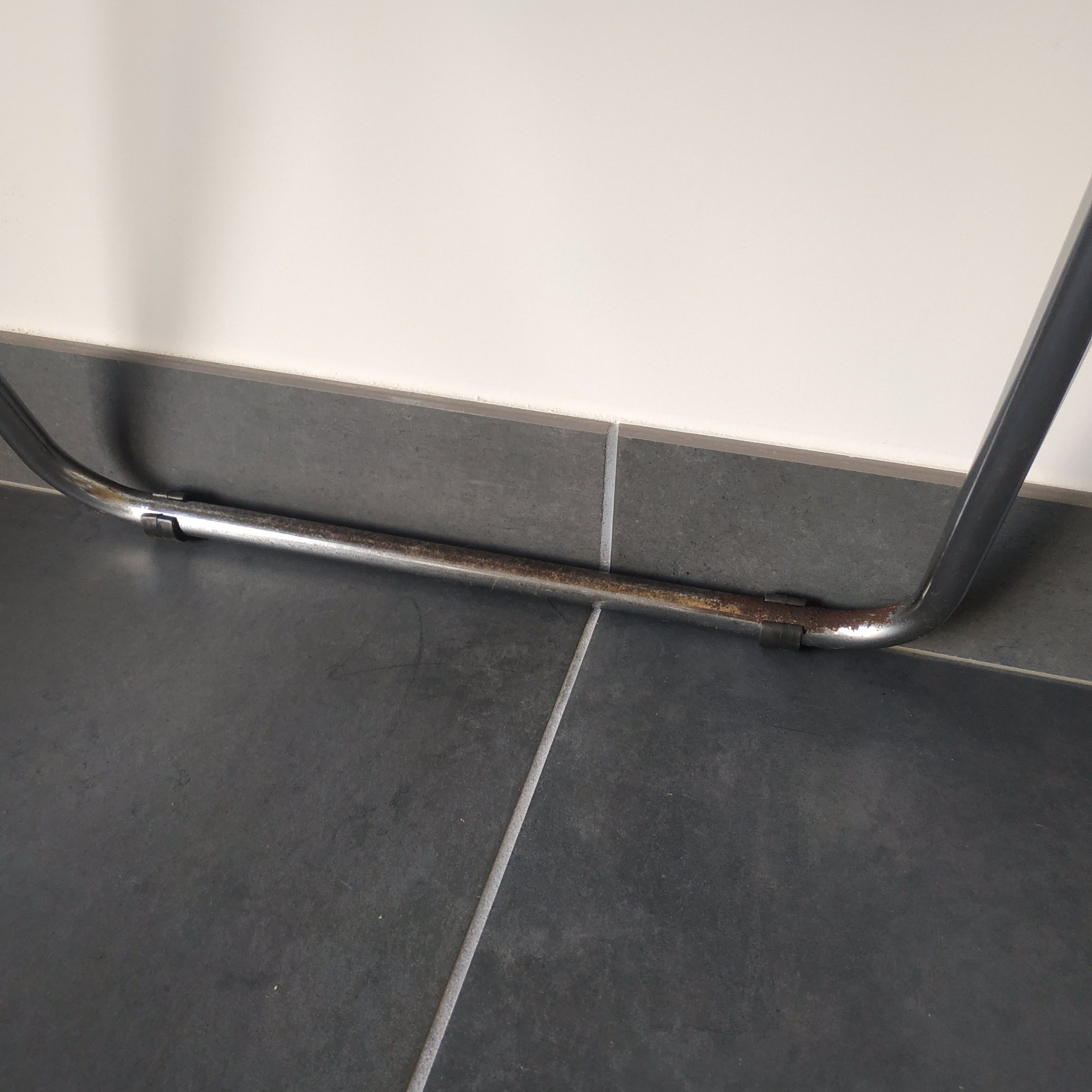 Seventies stainless steel and caramel chairs