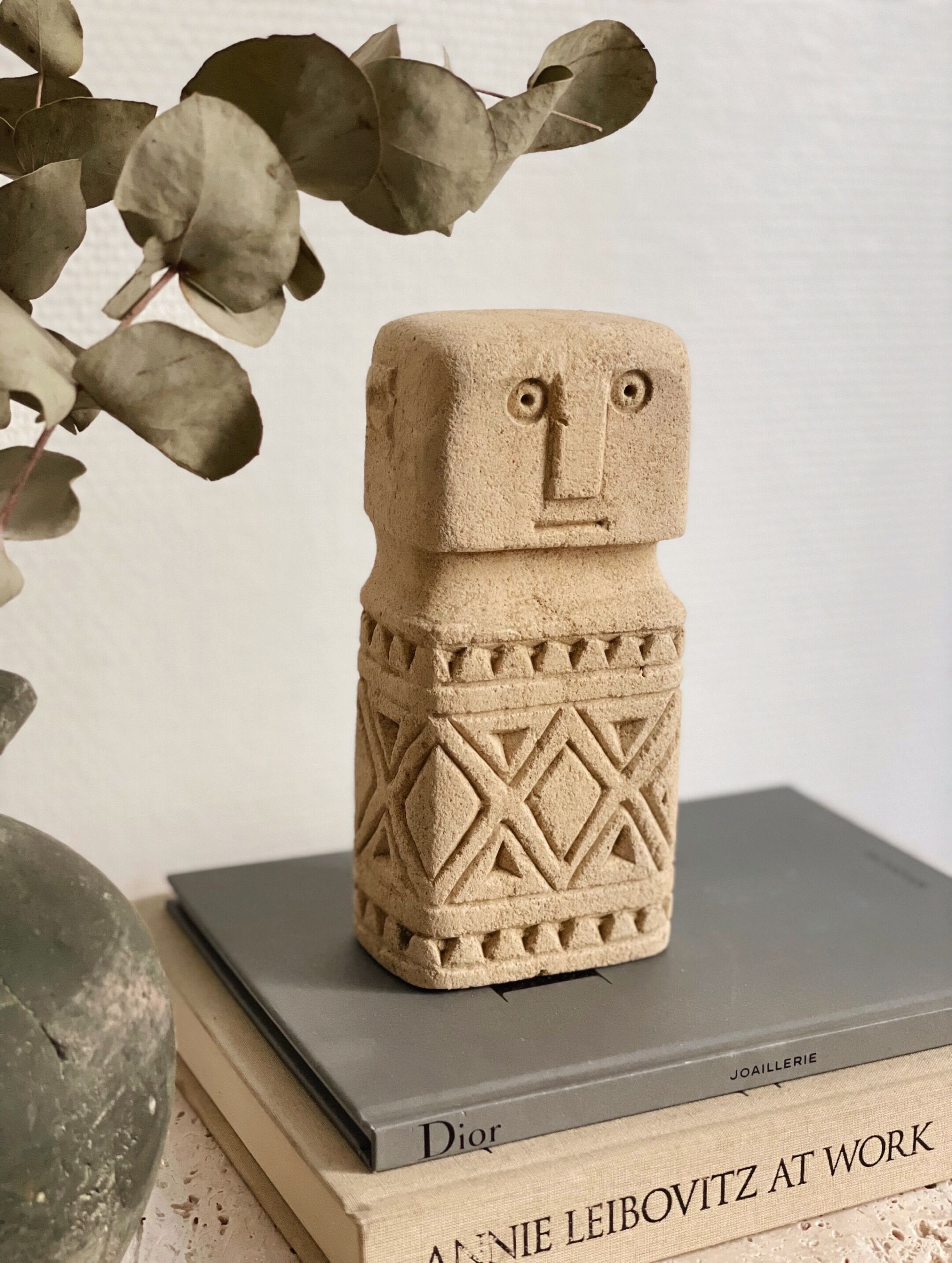 minimalist stone faces