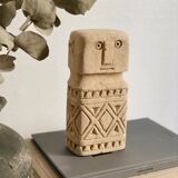 minimalist stone faces