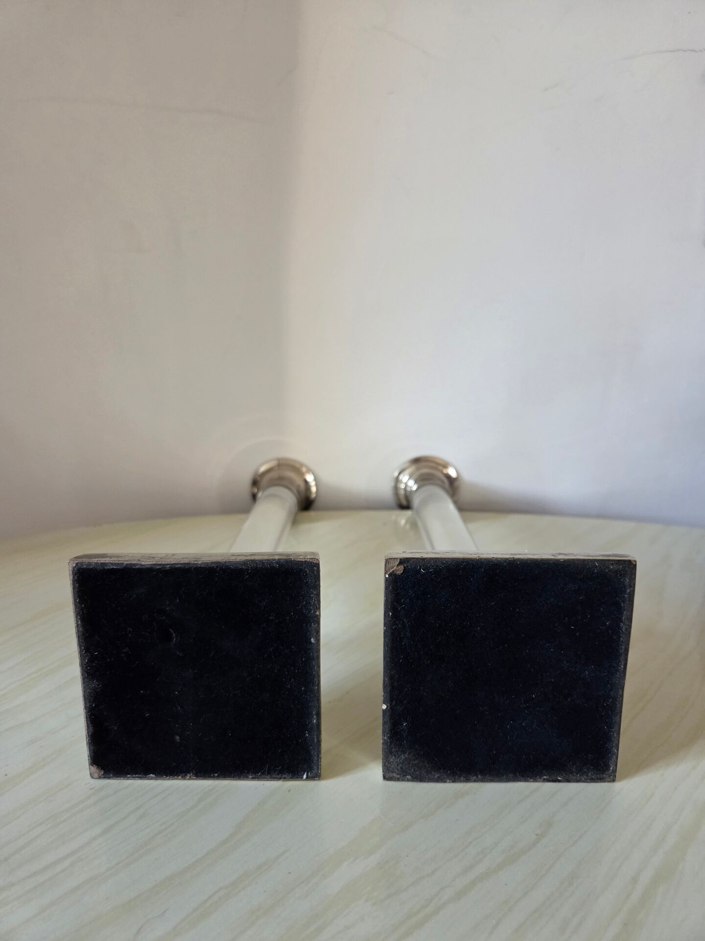 Pair of lucite and silver-plated candlesticks