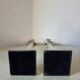 Pair of lucite and silver-plated candlesticks