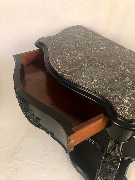 Pair of blackened wooden consoles, marble top