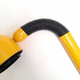 Bright yellow tubular desk lamp from the 80s