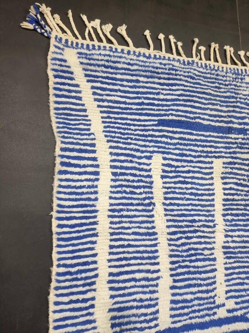 Handwoven Berber rug in blue and white, size 150x250 cm.