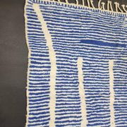 Handwoven Berber rug in blue and white, size 150x250 cm.