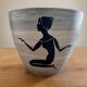 Milet cache-pot Sèvres, hand-decorated with a kneeling woman, 1950s.
