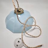 Suspension in opaline